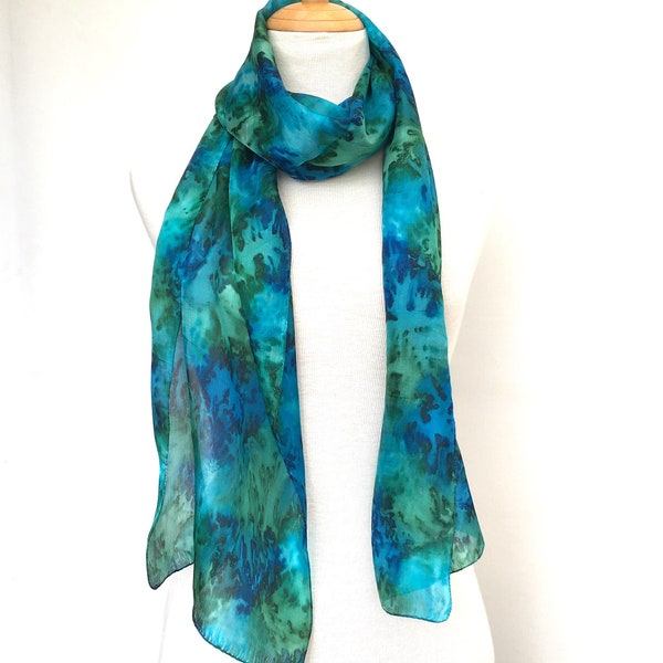 Silk scarf in rich peacock blues and green. Light floaty hand-painted silk in a generous 72" (180cm) long.
