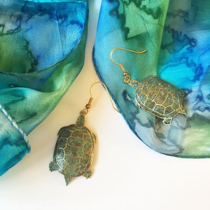 Turtle earrings in blue, pinks or orangy brown