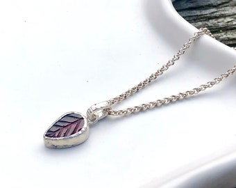 Silver charm with garnet gemstone, leaf-shaped, cool, unique gift, birthstone