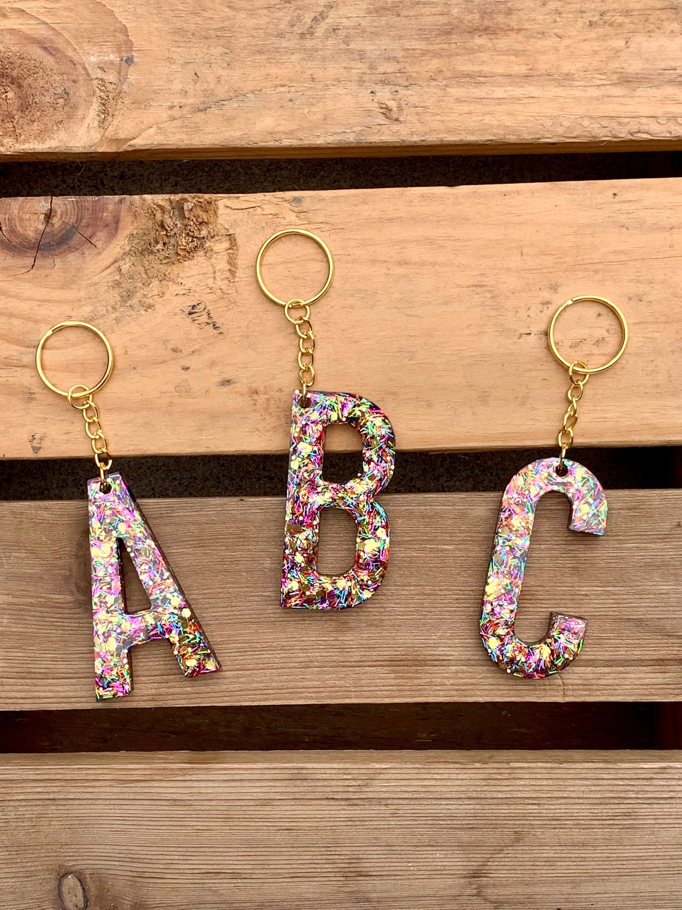 Acrylic Resin Keychain With Glitter Resin Pendant And A Z Letter Design  Stylish Car Keyring Holder For Womens Bags And Gifts From Yambags, $1.3
