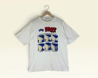 Camiseta vintage dos anos 90 "O Peido" - Uma pequena explosão entre as pernas / Camiseta com estampa engraçada de humor escatológico / Branca - Tamanho G