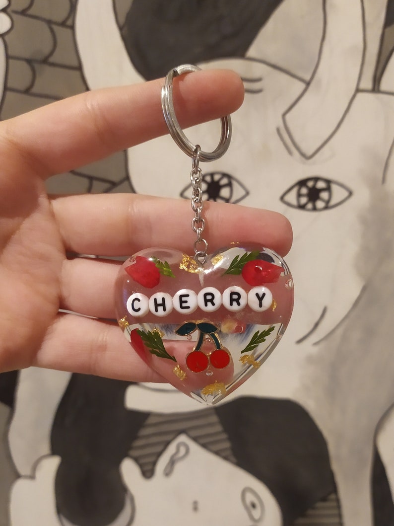 Custom keychains from Harry Styles and Louis Tomlinson resin with flowers and stainless steel ring