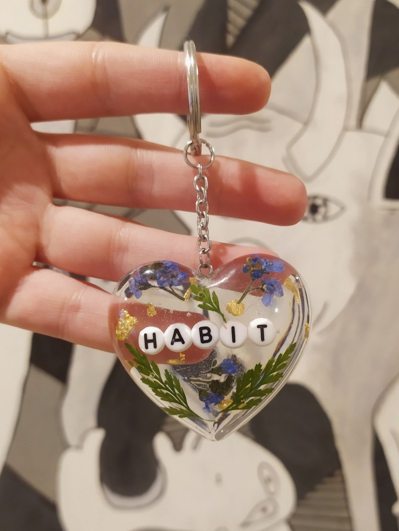 Custom keychains from Harry Styles and Louis Tomlinson resin with flowers and stainless steel ring