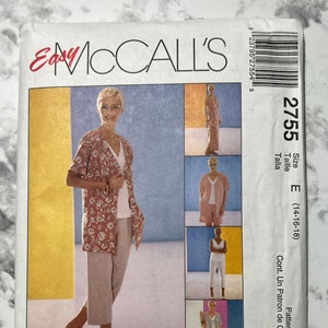 May include: A sewing pattern for a women's top and trousers. The pattern is for sizes 14-16-18. The pattern is called "Easy McCall's" and is part of the "Non-Stop Wardrobe" collection. The pattern is for a cut-to-fit style.