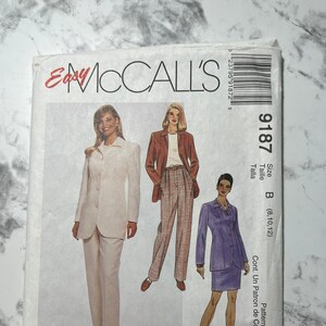 May include: A sewing pattern for a blazer and trousers. The pattern is for sizes 8, 10, and 12. The pattern is called "Easy McCall's" and the pattern number is 9187.