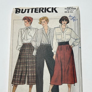 May include: A vintage sewing pattern for women's clothing, featuring three different styles. The pattern is from Butterick and is size 6-8-10. The pattern shows a woman wearing a white blouse with a bow tie, a plaid skirt, and a pair of brown shoes. Another woman is wearing a gray blouse with a black belt, black pants, and brown shoes. The third woman is wearing a white blouse with a black belt, a red skirt, and brown shoes.