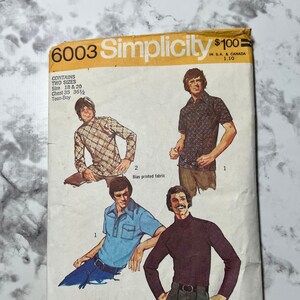 May include: A vintage Simplicity sewing pattern for making shirts. The pattern is for sizes 18 and 20, with a chest measurement of 89 to 93 cm. The pattern includes instructions for making a long-sleeved shirt with a plaid pattern, a short-sleeved shirt with a floral pattern, and a turtleneck sweater. The pattern is titled "6003 Simplicity" and is priced at £1.00.