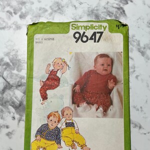 May include: Simplicity sewing pattern number 9647 for babies, size 6 months. The pattern includes instructions for making three different outfits: a red and white polka dot jumpsuit, a yellow jumpsuit with a blue and white floral top, and a blue and white floral top with yellow pants.