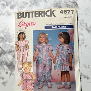 May include: A vintage sewing pattern for children's clothing. The pattern is for a jumpsuit, a dress, and a romper. The pattern is from Butterick and is labeled "Bryan" and "4677". The pattern is for sizes 4-5-6.