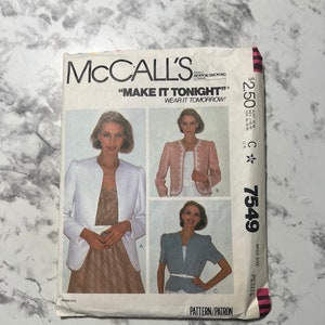 May include: A sewing pattern for a jacket, labeled "Make it Tonight!" and "Wear it Tomorrow!" The pattern is for a miss petite size and is number 7549. The pattern shows three different views of the jacket, one in white, one in pink, and one in blue.