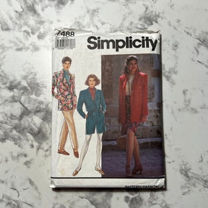 May include: Simplicity sewing pattern number 7488 for jackets and pants. The pattern shows three models wearing different styles of jackets and pants. The pattern is printed on a white background with black text.