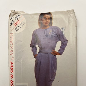 May include: A sewing pattern for a dress with long sleeves and a gathered waist. The pattern is for sizes 6-8-10 and is from McCall's Stitch 'n Save line. The pattern number is 3797.