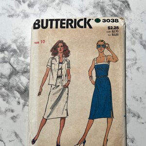 May include: Vintage sewing pattern for a dress and a top. The pattern is from Butterick and the pattern number is 3038. The pattern is for size 10. The dress is blue and the top is white.