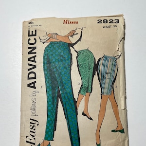 May include: Sew-Easy patterns by Advance pattern for Misses, size 2823, waist 30. The pattern shows three different styles of pants with a checkered, green, and striped pattern.