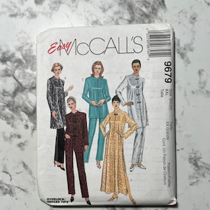 May include: A sewing pattern for a long-sleeved jacket and pants, or a long dress. The pattern is for sizes 24-26 and is called McCall's Easy 9679.