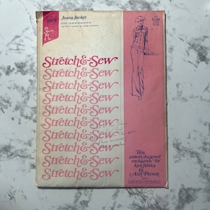 May include: A vintage sewing pattern for a jeans and jacket set. The pattern is titled "Stretch & Sew" and is designed exclusively for knit fabrics by Ann Person. The pattern number is 1065 and the sizes are 28-30-32-34-36-38-40-42.