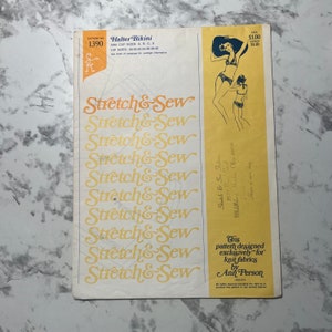 May include: A vintage sewing pattern for a halter bikini. The pattern is designed for knit fabrics and is by Ann Person. The pattern number is 1390. The pattern is for bra cup sizes A, B, C, and D and hip sizes 29-30-32-34-36-38-40.