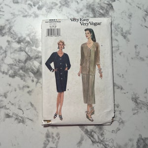 May include: A sewing pattern for a dress with two different styles. The pattern is for sizes 14-18 and is from Very Easy Very Vogue. The pattern number is 8941.