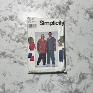May include: Simplicity sewing pattern number 8357 for sizes S, M, L, XL. The pattern includes instructions for making scrubs with a variety of colors and patterns. The pattern is shown on two models, one wearing a blue scrub top and pants, and the other wearing a pink scrub top and pants.
