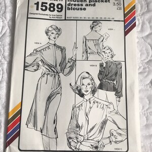 May include: A sewing pattern for a dress and blouse with a hidden placket. The pattern is for knit fabrics and includes sizes 28 to 44. The pattern is called "Stretch & Sew" and the pattern number is 1589.