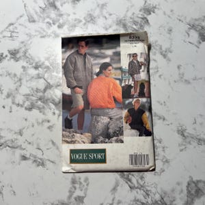 May include: A sewing pattern for a quilted jacket. The pattern is for sizes L-XL and is from Vogue Sport. The pattern number is 8333.