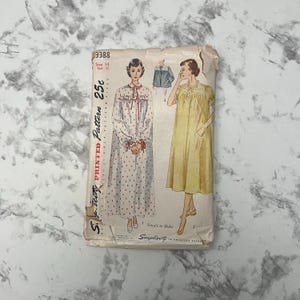 May include: Vintage Simplicity sewing pattern number 3388 for a nightgown. The pattern is for size 14 and costs 25 cents. The pattern shows two different styles of nightgowns, one with polka dots and one with a solid color.