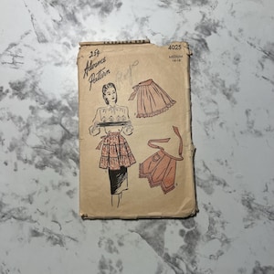 May include: Vintage sewing pattern for a woman's apron. The pattern is for sizes 16-18 and is from Advance Pattern #4025. The pattern shows a woman wearing a skirt and apron with a ruffled edge.