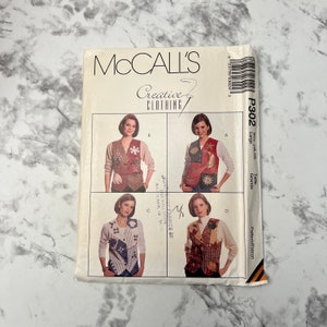 May include: A sewing pattern for a vest, with four different designs. The pattern is from McCall's Creative Clothing and is size 16-18, or Large. The pattern number is P302.