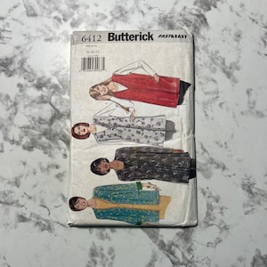 May include: A sewing pattern for a long vest, jacket, and top. The pattern is from Butterick and is for sizes 8-10-12. The pattern is called "Fast & Easy".