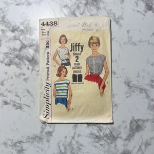 May include: Simplicity sewing pattern number 4438 for a Jiffy blouse. The pattern is for a size 12 with a bust measurement of 32 inches. The pattern includes two main pattern pieces and is easy to cut and sew.