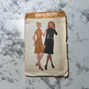 May include: Vintage Simplicity sewing pattern featuring two dress designs. The pattern envelope shows illustrations of the dresses, one in a mustard color and the other in black. The envelope has the number 9655 and the size 14, bust 36.
