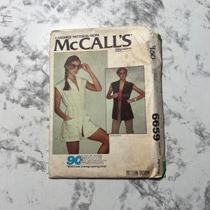 May include: A vintage McCall's sewing pattern for a sleeveless vest and a short, sleeveless dress. The pattern is for a petite size and is part of the 90 Minute Fashion line. The pattern cover features two models wearing the garments. The pattern number is 6659.