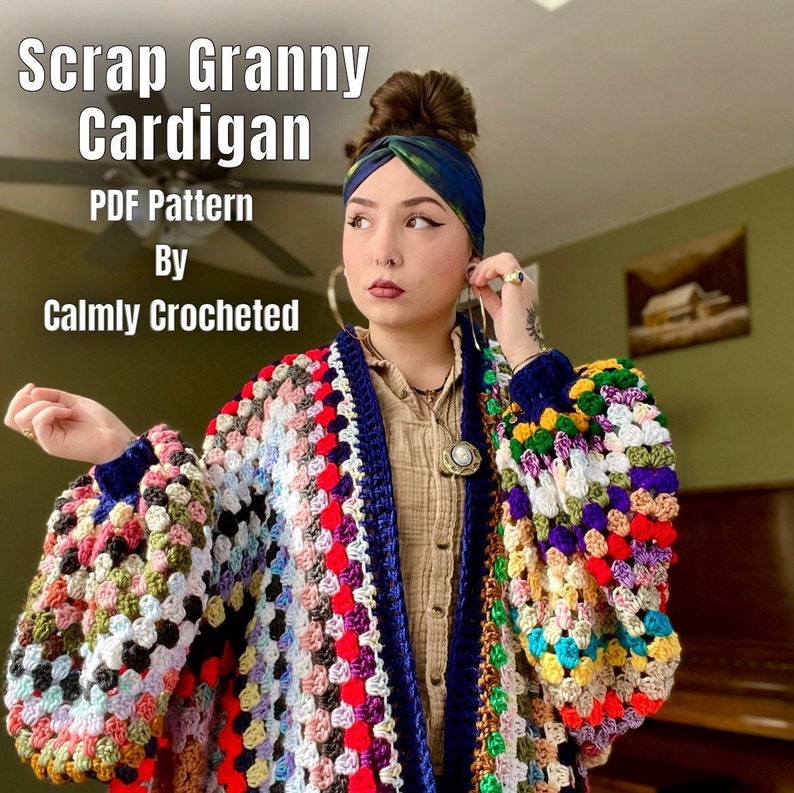 May include: A colorful granny square crochet cardigan with a blue trim. The cardigan has a relaxed fit and long sleeves. The text "Scrap Granny Cardigan PDF Pattern By Calmly Crocheted" is visible in the image.
