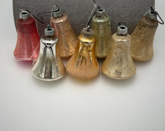 Set of 7 vintage assorted colors mercury glass bell Christmas ornaments in good condition.