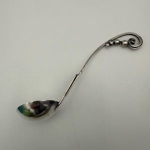 Vintage Georg Jensen sterling silver ladle spoon made in Denmark with decorative handle