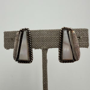 Vintage Navajo signed BT sterling silver and conch shell clip earrings