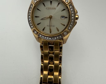Reloj Citizen Eco-Drive Silhouette vintage para mujer, tono dorado y cristal, en perfecto estado de funcionamiento.