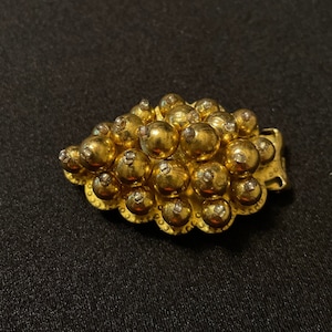 Vintage miriam haskell unsigned hand wired gold bead dress clip