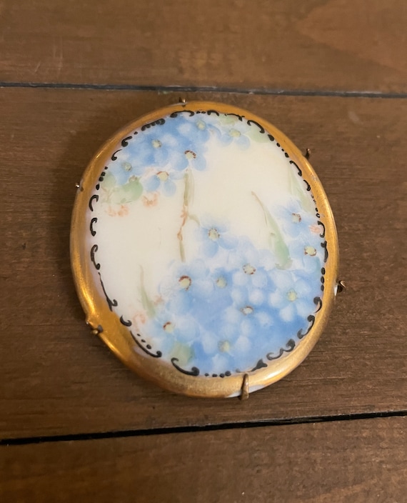 Victorian hand painted flowers on porcelain brooch