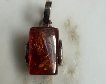 Sterling silver and genuine amber pendant