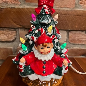Vintage ceramic lighted Christmas tree with elf