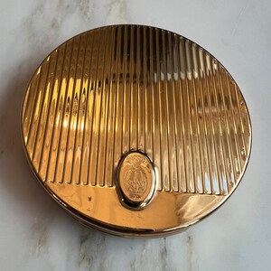 Vintage Coty round gold tone French flair Florida compact