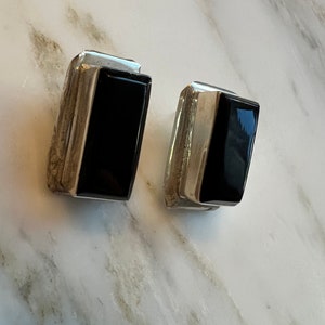 Vintage sterling silver Mexico pierced earrings with inlaid onyx. 1” L X .50” W