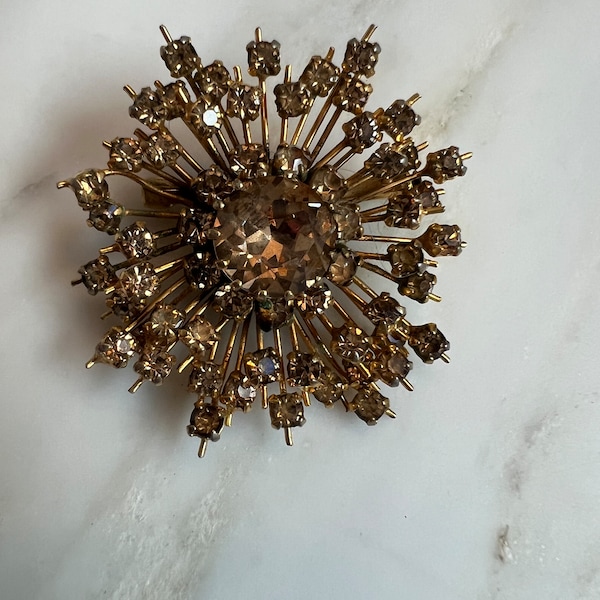 Vintage atomic starburst rhinestone brooch with trombone clasp