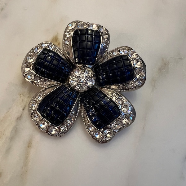 Vintage Nina Ricci for Avon sapphire invisible set rhinestone flower brooch