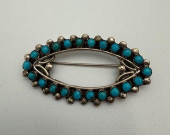 Vintage Zuni signed sterling silver and turquoise snake eye brooch signed TVintage
