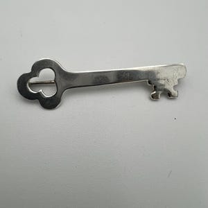 Vintage handmade sterling silver skeleton key brooch
