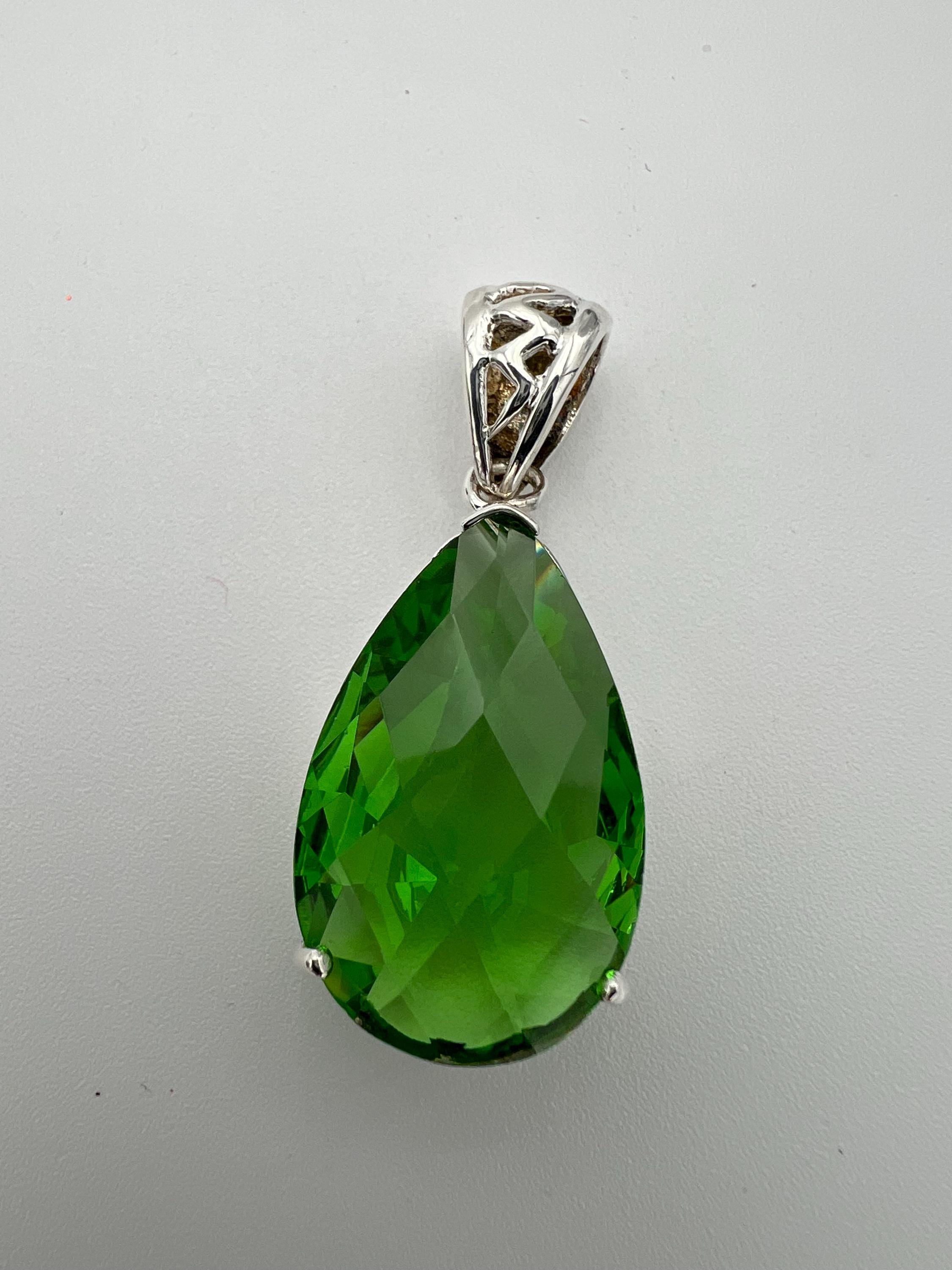 sterling silver faceted green glass pendant