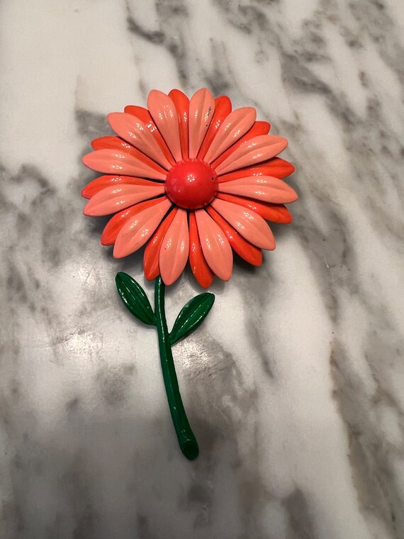 Vintage orange enameled daisy flower brooch