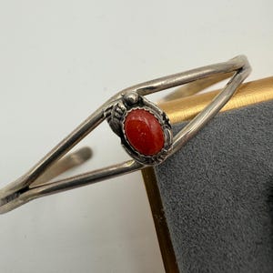 Vintage petite Navajo sterling silver and red coral cuff bracelet artist signed